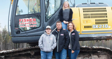 Fisher Family with digger