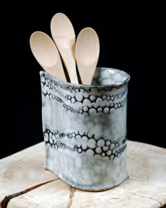 wooden spoons in pottery