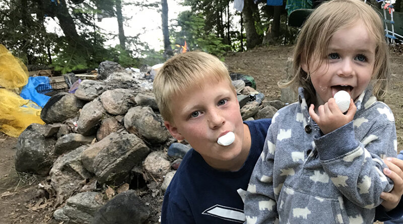 two kids with marshmallows