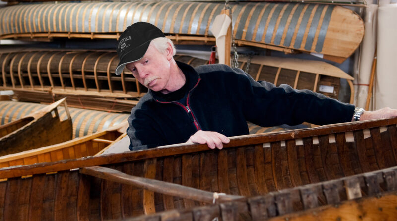 Dick surveying canoe in for repairs
